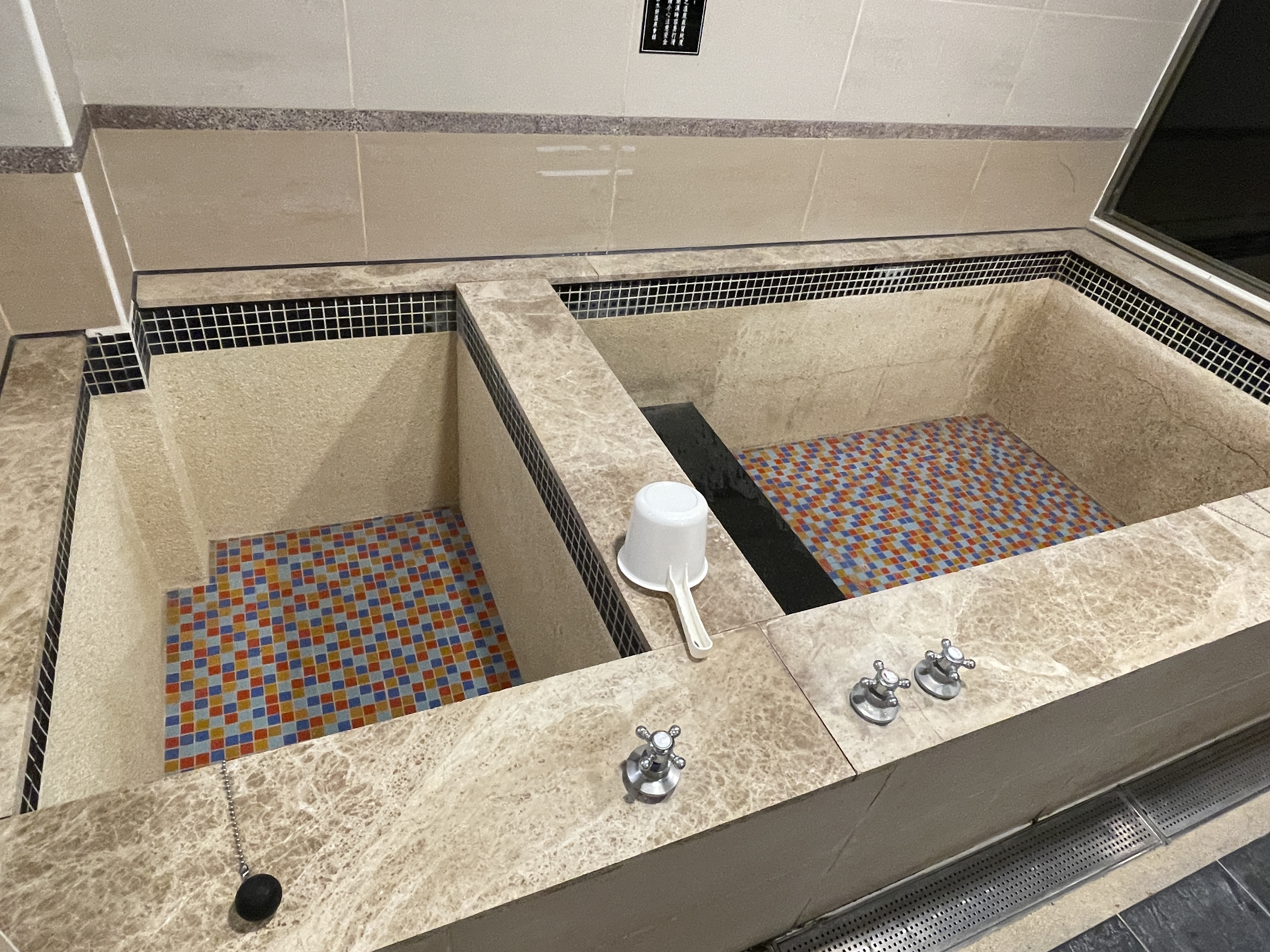 Two onsen tubs side by side